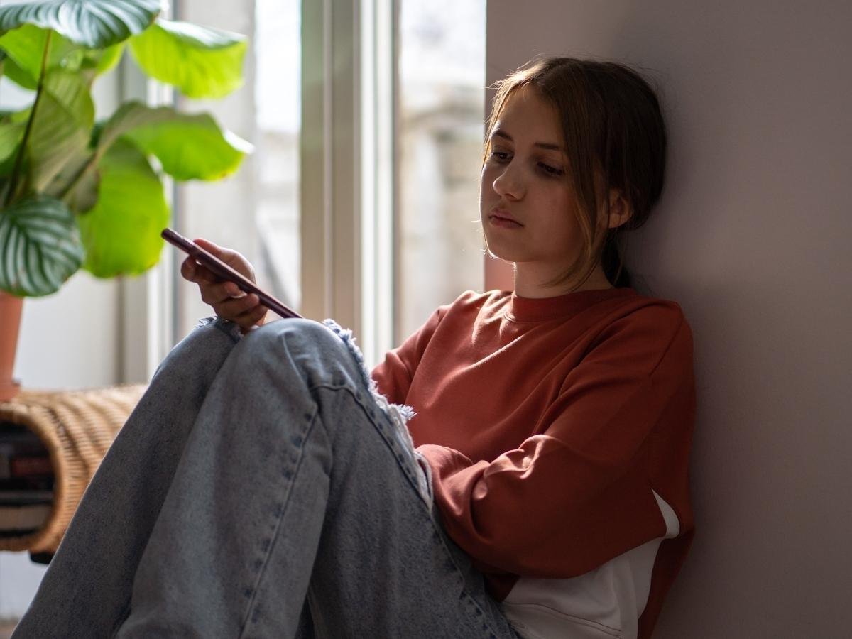 girl thinking if she is depressed or just sad